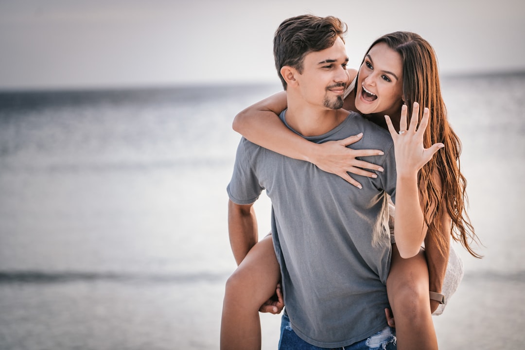 A couple getting engaged on the beach